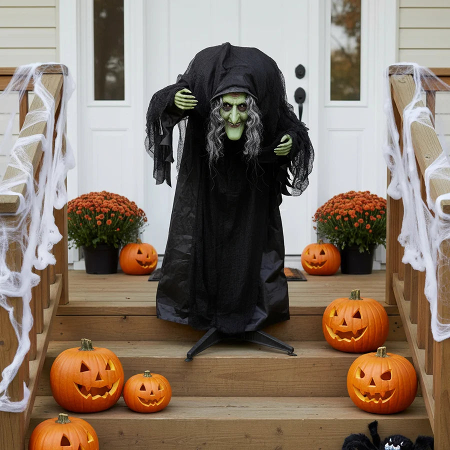 Animated hunchback witch Halloween prop, 91cm, in a black cloak with glowing red eyes