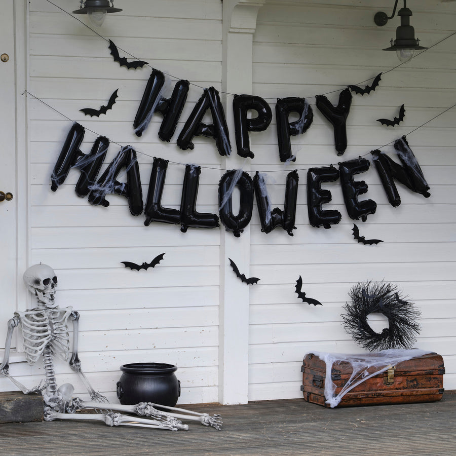 Happy Halloween black letter balloon bunting with bats and cobwebs